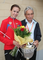 Gulnara Galkina-Samitova with coach