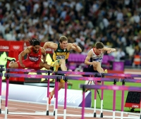 XXX OLYMPIC GAMES (Athletics). Final at 110 Metres Hurdles. Jason Richardson (USA), Lehann Fourie (RSA), Lawrence Clarke (GBR)