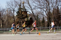 Russian Road Race Championships 2013. Athletes run up to the Cathedral of Christ the Saviour