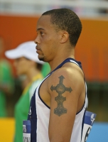 TATTOO SPORT. Wallace Spearmon, United States. On the left forearm tattoo cross