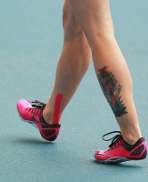 TATTOO SPORT. Tattoo a beacon with an inscription of "HEART"